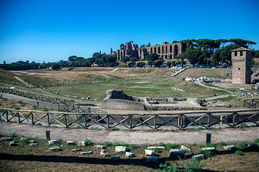 The Roman Forum is a rectangular plaza surrounded by the ruins of several important ancient government buildings at the center of the city of Rome