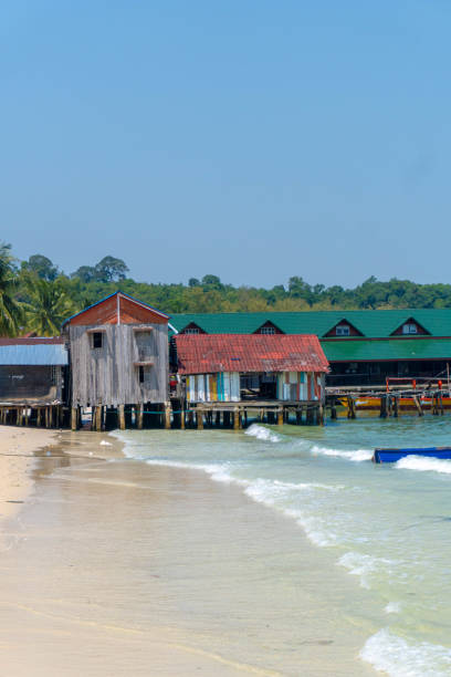 istock old colored buildings on stilts on the beach 1492889425