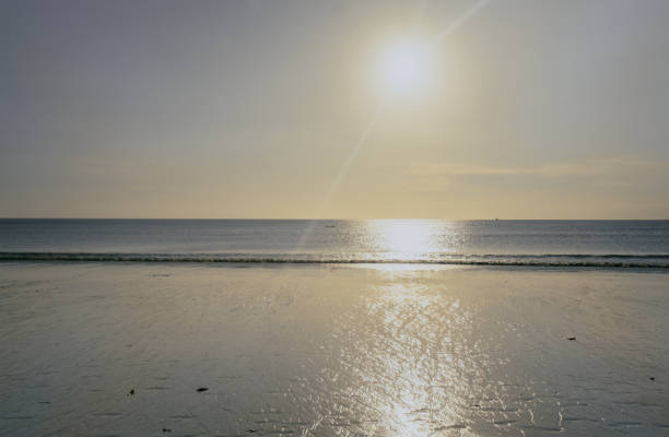 Photo of a beautiful beach scene at dusk.