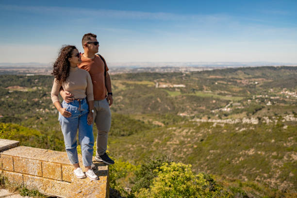 istock Couple contemplating nature viewpoint 1492893861