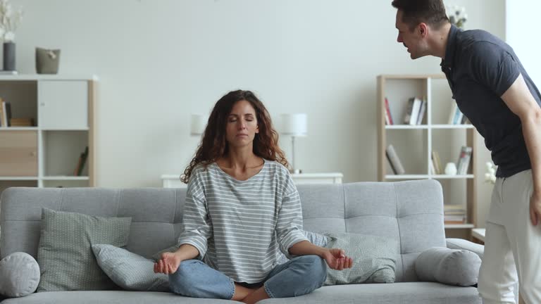 Boyfriend screams at girlfriend while she does meditation practice