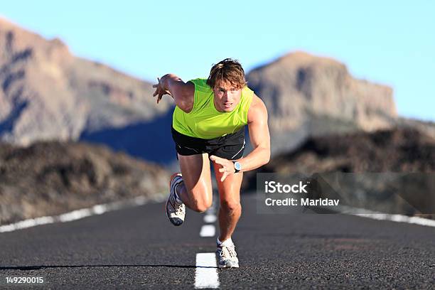 Sprinter Running On Road Stock Photo - Download Image Now - 20-29 Years, 25-29 Years, 30-39 Years