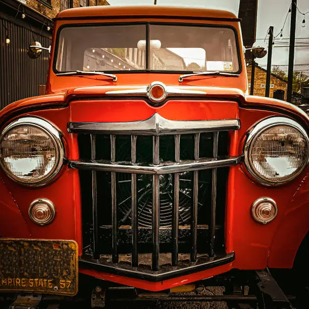 The front end of an old, vintage Willy’s Jeep.