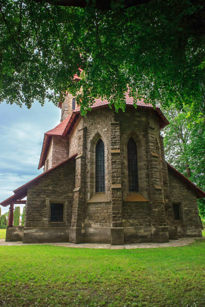 istock Catholic church and green lawn,  gothic style 1492903525