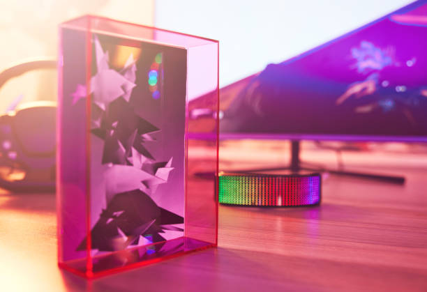 istock VR, metaverse or neon with a 3d model and goggles on a desk for access to the digital or virtual world. Virtual reality, cyberpunk and gaming with still life objects in an empty room for gaming 1492906318