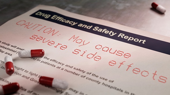 A photorealistic image of a drug safety and efficacy report. The words \