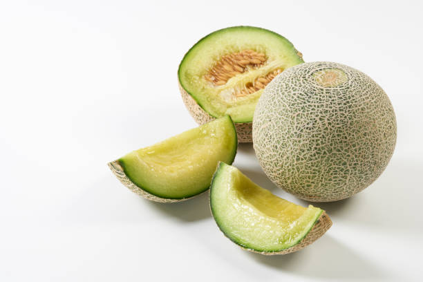 istock Ripe green flesh melon on white background 1492909288