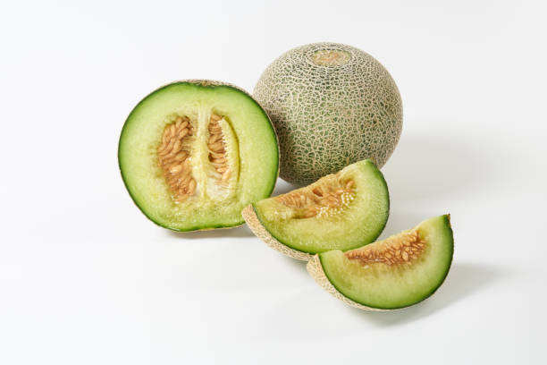 istock Ripe green flesh melon on white background 1492909475