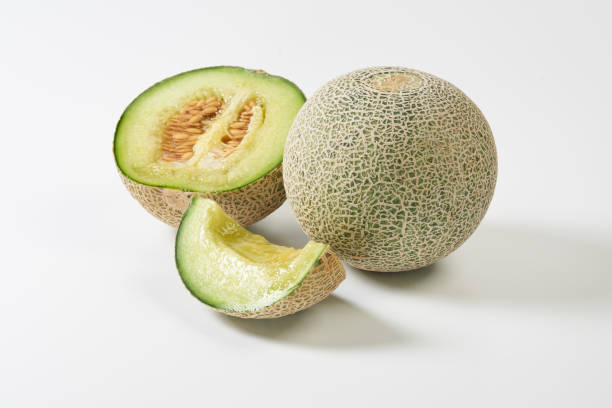 istock Ripe green flesh melon on white background 1492910376