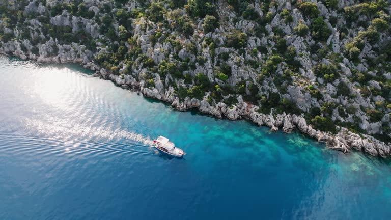 Simena - submerged ancient Lycian city Kekova island Ruins of ancient architecture, aerial view of sunken historical sunken city, place to explore submarine, clean submarine, discovery point for divers, a boat for a cruise in the sunken city