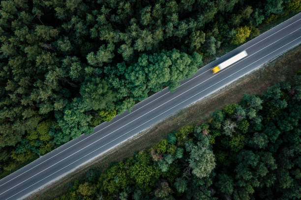 istock Truck on road, motion blue, delivery service 1492914886