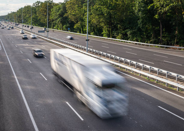 istock Freight delivery service, traffic on speedway, motion blur 1492915010