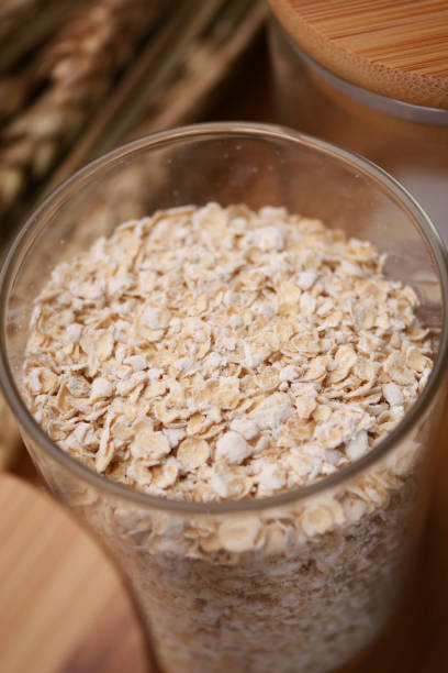 istock oats flakes in a jar with spoon on table 1492916443