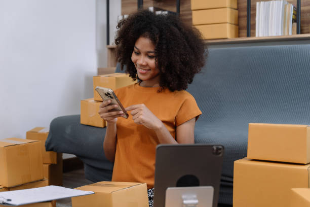istock Startup or small business entrepreneur in e commerce, or logistics in remote startup at home. African American female owner selling online on the Internet, SME, shipping boxes, store success. 1492917807