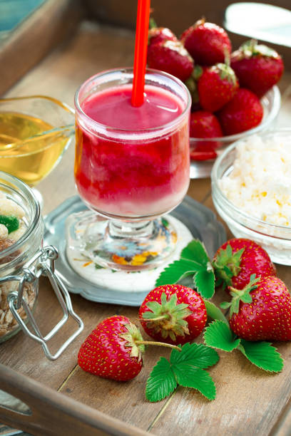 istock Berry strawberry on the old background. 1492918794