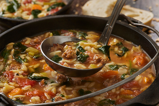 Italian Sausage and Spinach Orzo Soup with Toasted French Bread