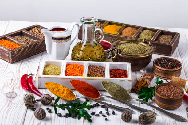 istock Spices and seasoning on old background. 1492923853