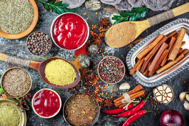 istock Spices and seasoning on old background. 1492924125