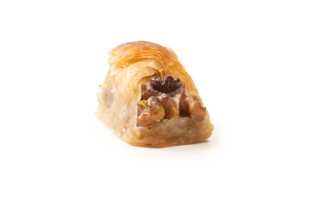 istock Delicious sweet baklava with walnuts isolated on white background. 1492924693