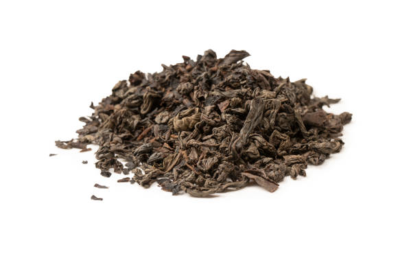 istock Dried tea leaves isolated on a white background. 1492924750