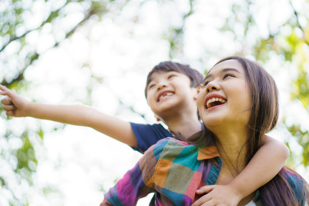 istock Boy and mon playing in the park. 1492927436