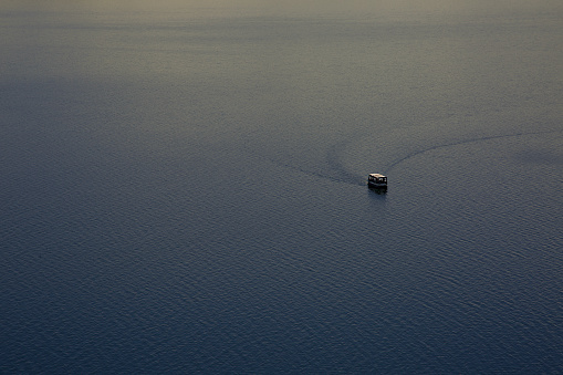 Lake Sevan. Lonely ship. Silence