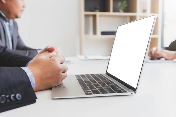 istock Businessman using laptop while conference in meeting room at office. 1492929350