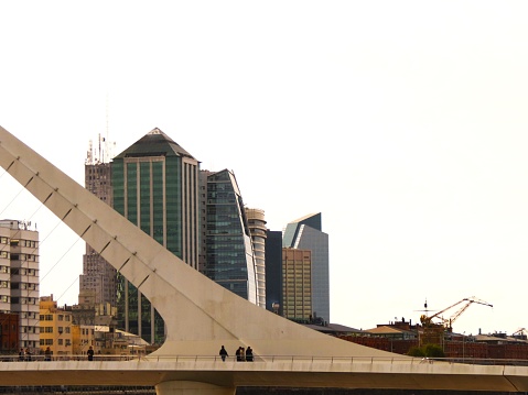 Buenos Aires, Argentina . 09/17/2019 Cityscape of Puerto Madero . The Woman´s Bridge (Puente de la Mujer) designed by the Spanish architect Santiago Calatrava.