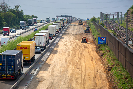 Floersheim, Germany - May 22, 2023: Large road construction site and dense traffic on German highway A3 between Raunheim and Wiesbadener Kreuz.