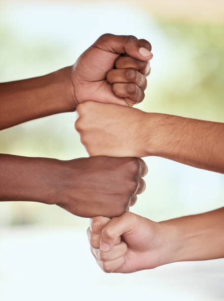 istock Closeup, hands and fist for collaboration, stack and community with partnership for goal, support and solidarity. Zoom, hand and people with team building, success and motivation for growth or target 1492939009