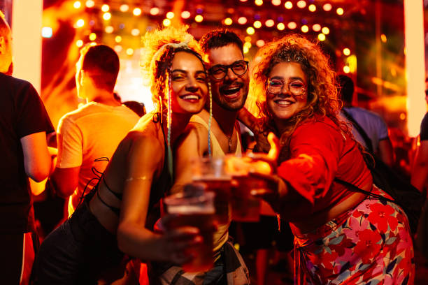 istock Friends enjoying concert with beers. 1492942018