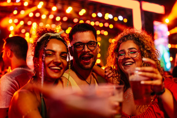 istock Happy friends toasting at concert. 1492942741