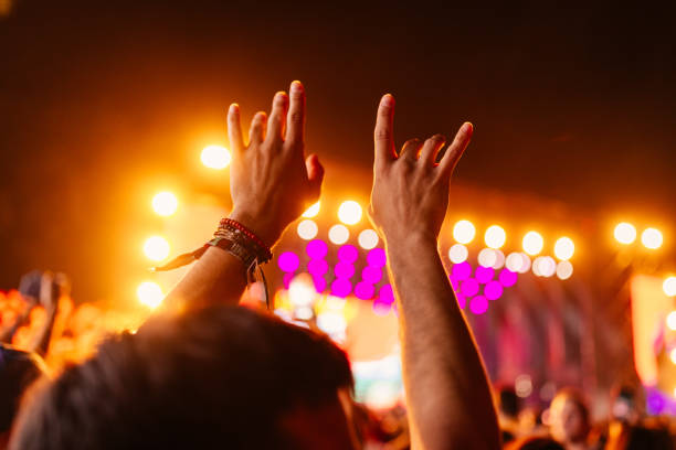 istock Hands in air at concert 1492951778