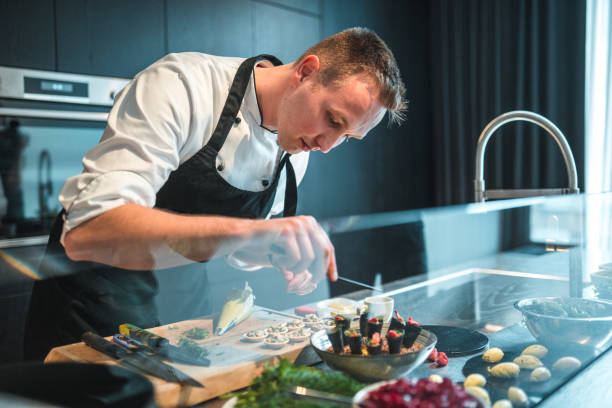 istock Expert Chef in Action: Crafting Gourmet Cuisine for Bachelorette Celebration 1492955714