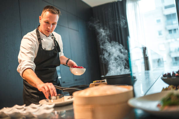 istock Talented Chef Cooking Dishes for a Special Occasion 1492955763