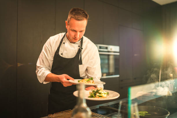 istock Young Chef Preparing Exquisite Delights for Bachelorette Dinner 1492955909