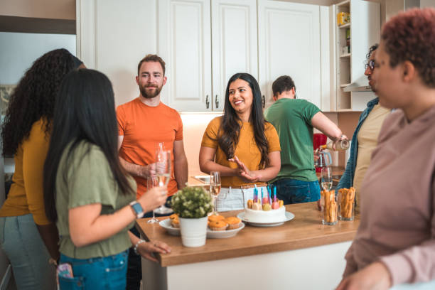 istock Diverse Friends Enjoying Champagne Celebrating Birthday 1492956344