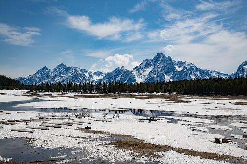View of Teton range across bay not open for season in  Wyoming's Yellowstone Ecosystem in west USA, North America.