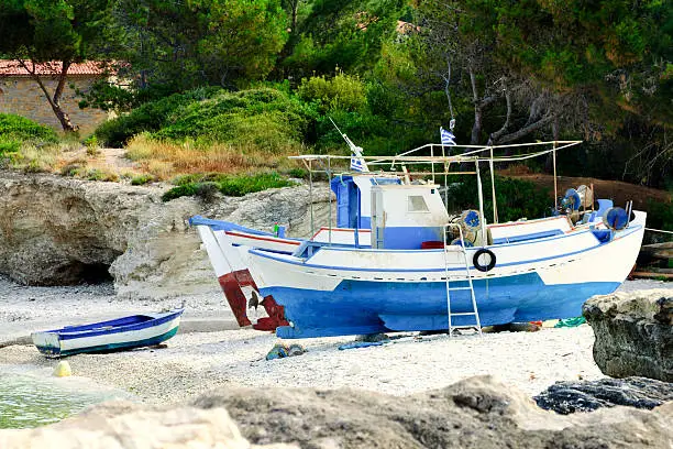 Fishing boats on beach for repair-work