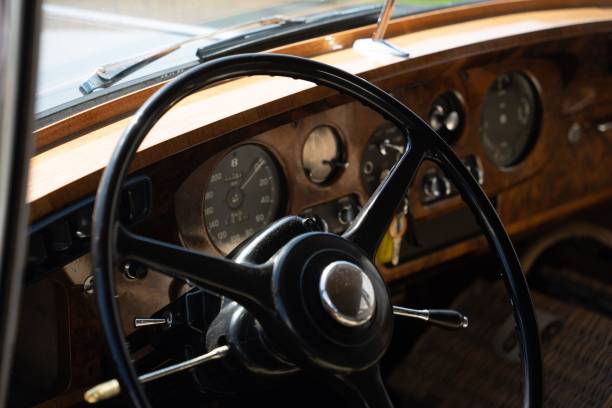 istock Antique vehicle steering wheel with a dashboard. 1492968107