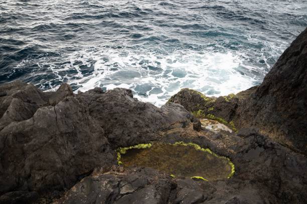 istock Relaxing view of coastal cliffs and tranquil blue waters. 1492968169