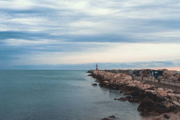 istock some rocks that are by the ocean and in the sand 1492968892