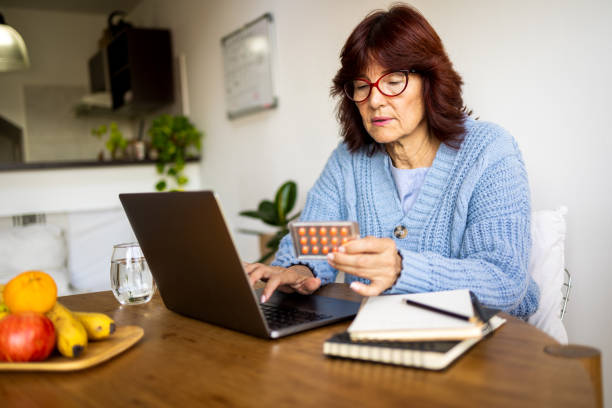 istock Woman reading information about medication online 1492975595