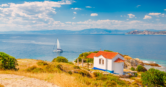 Sea coast and old church near Limenas, Thassos island, Greece, Europe