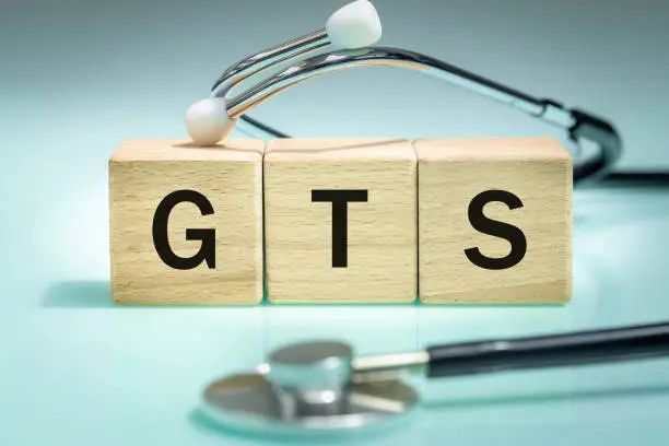GTS,  Gilles de la Tourette syndrome a neurodevelopmental disorder in children causing motor and vocal tics, Health concept, Rare disease symbol written on wooden blocks
