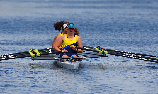 St Neots, Cambridgeshre, England - July 23, 2022: Ladies pairs Sculling on river  Ouse St Neots Cambridgeshire.