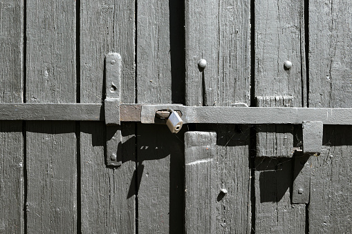 Old Door with Metal Key. Door in a tenement house in the center of Krakow.