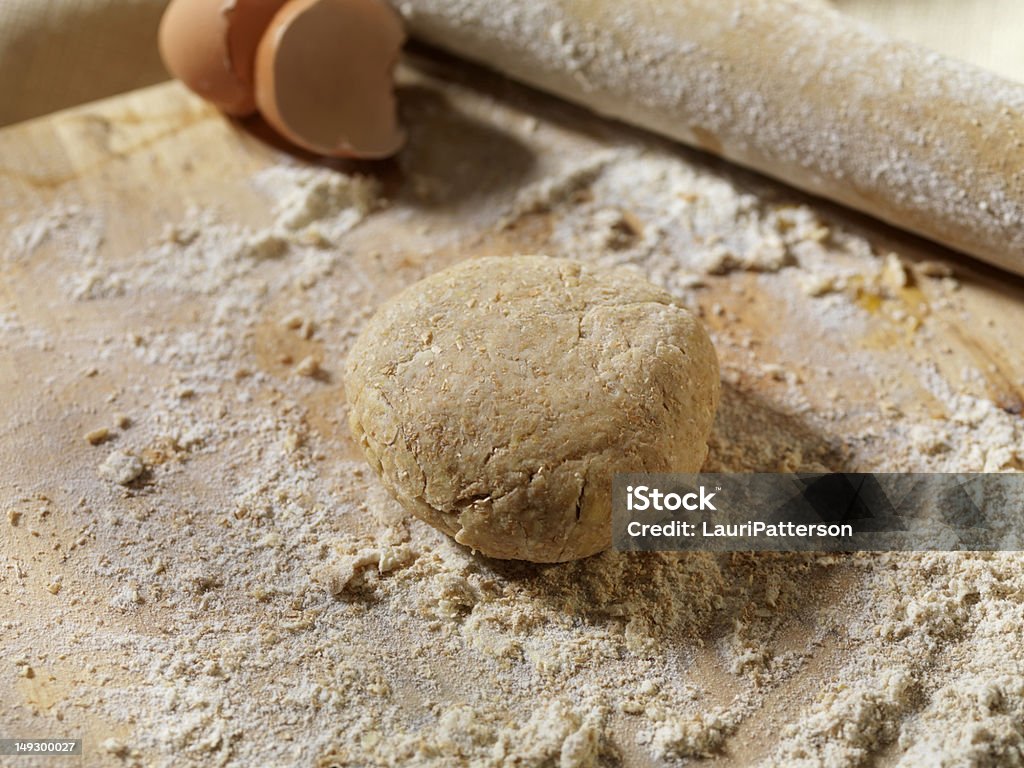 Making Dough Whole Wheat Dough on a Cutting Board -Photographed on Hasselblad H3D-39mb Camera Animal Shell Stock Photo