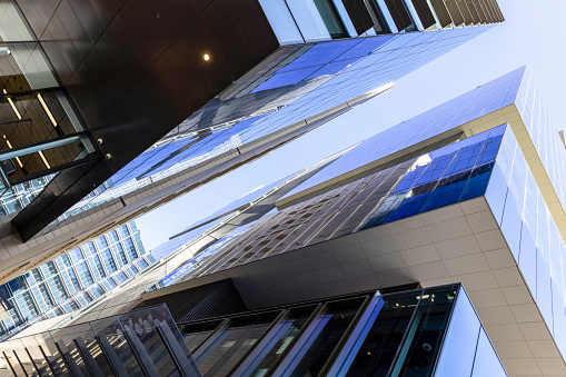 Low angle view of modern office skyscrapers and Wester Sydney University in Parramatta Square Parramatta CBD, sky background with copy space, full frame horizontal composition