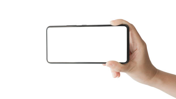 istock A woman's hand holding a modern smartphone mockup device touching the screen on white background. concept - cell phone in hand with white background - easy modification. 1493005135